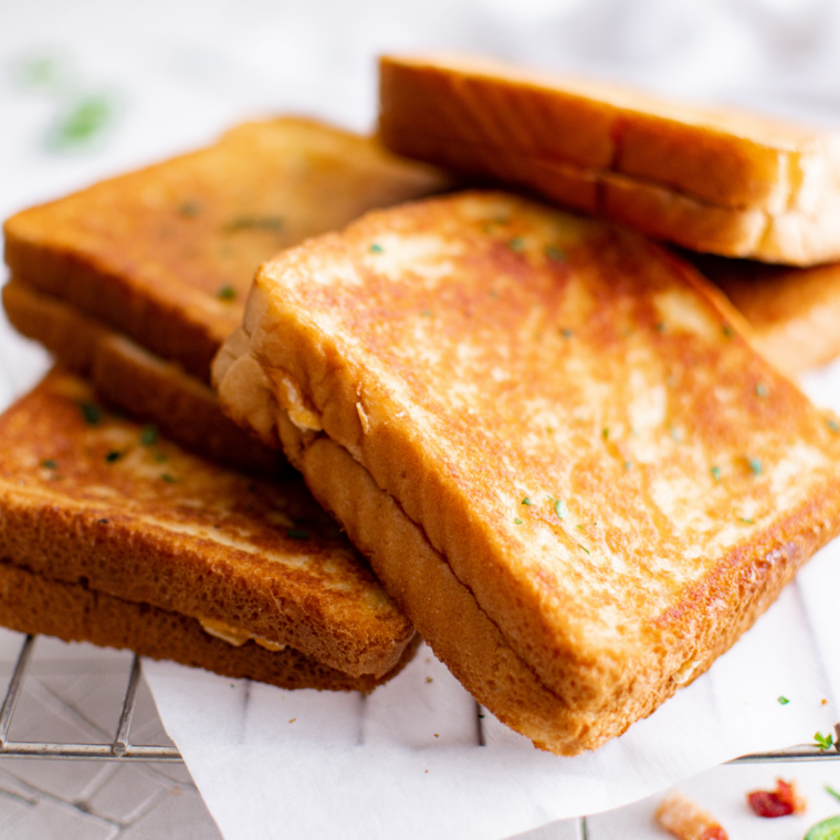 Three cheese toastie with garlic butter and melted mozzarella