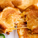 Make the ultimate Ninja Crispi Cheese Toastie with golden crispy bread and perfectly melted cheese in every bite. This quick and easy air fryer toastie recipe is perfect for lunch, snacks, or a fast comfort food dinner.