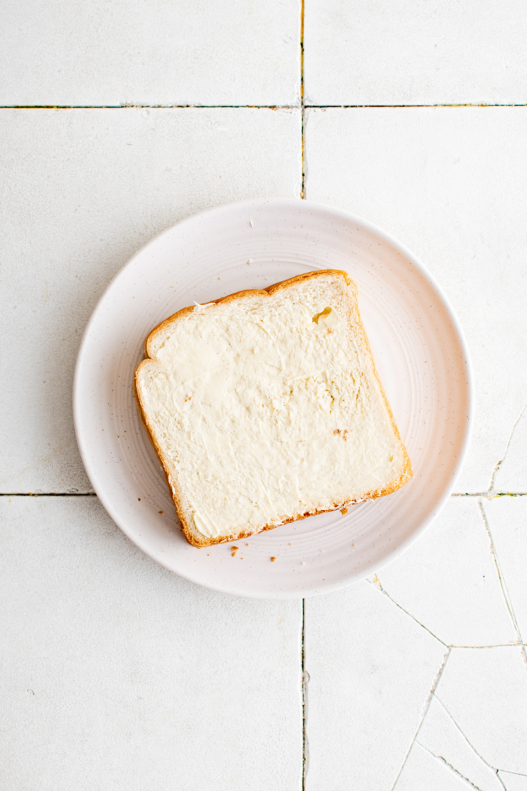 Cheese toastie assembled with Marmite and garlic butter