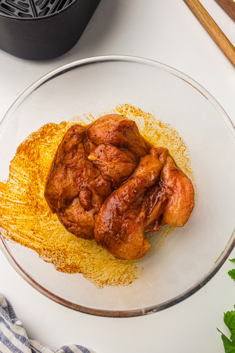 Chicken breasts soaking in homemade ginger garlic soy marinade