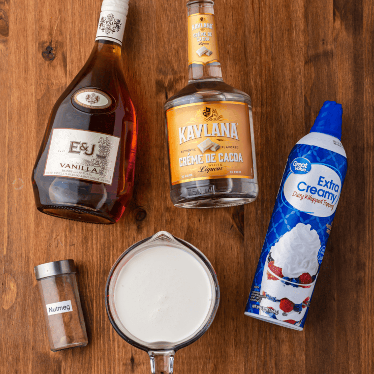 Ingredients needed for Ninja Slushi Frozen Brandy Alexander on kitchen table.