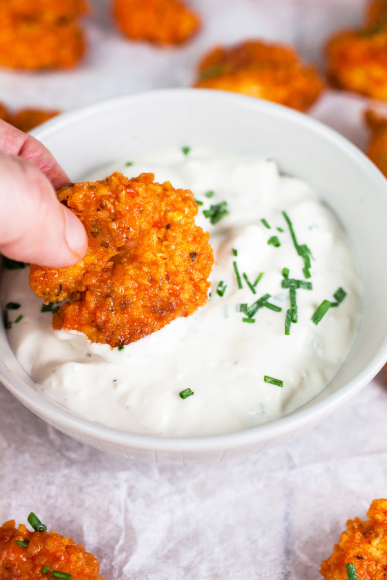 Creamy Popeyes-style ranch dressing served in small dipping bowl