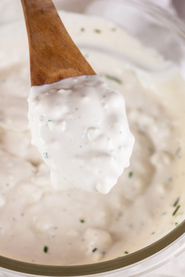 Mayonnaise, buttermilk, and sour cream whisked until smooth and creamy