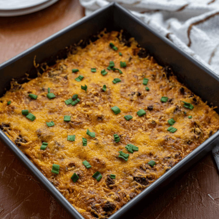 Hearty venison casserole baked in a dish with tender meat, vegetables, and rich gravy.