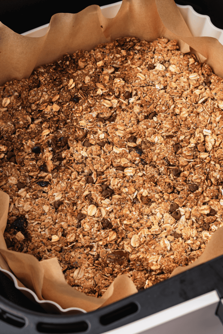 Close-up of crunchy air fryer peanut butter granola with chocolate chips