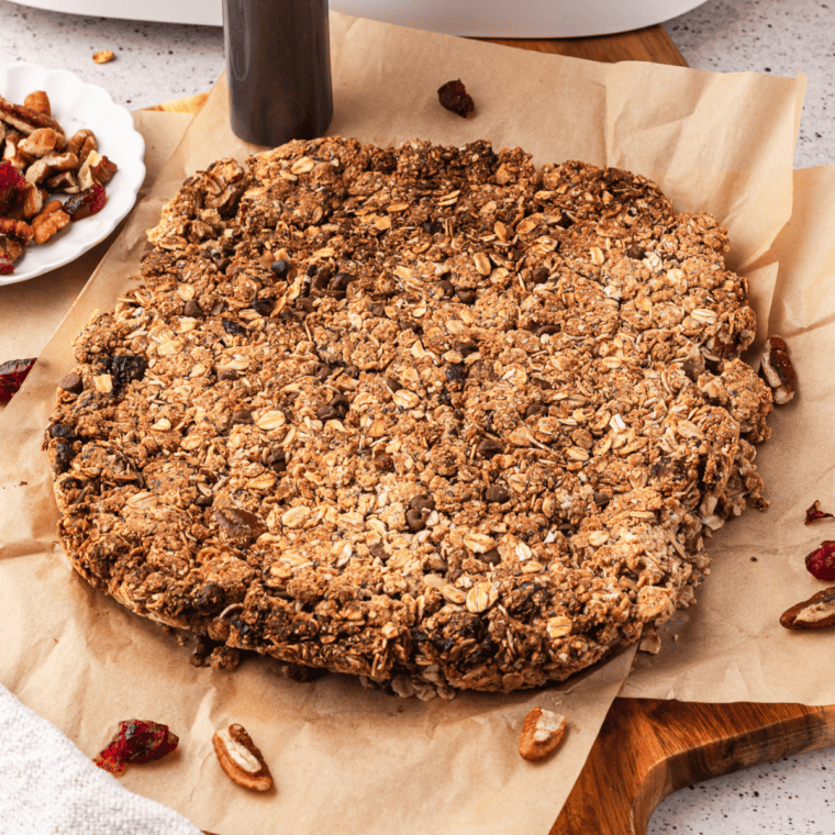 Plate of copycat KIND granola with crunchy multigrain clusters and chopped nuts