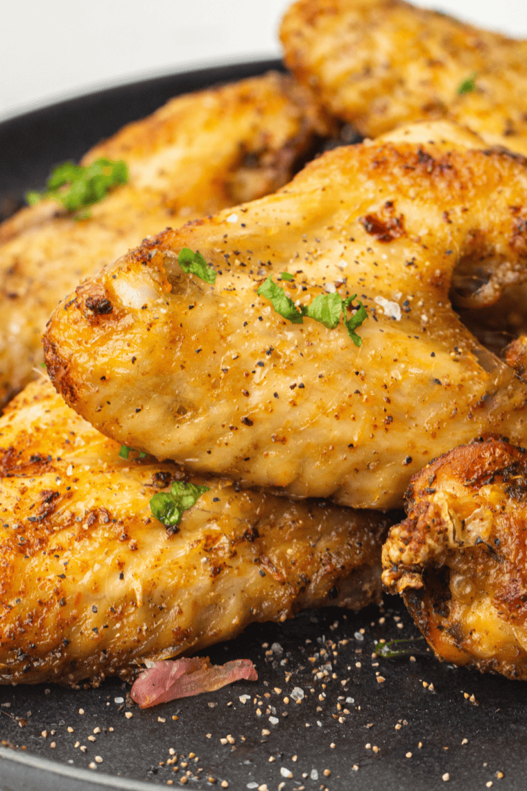 Crispy air fryer chicken wings seasoned with homemade Kinder's garlic and herb seasoning