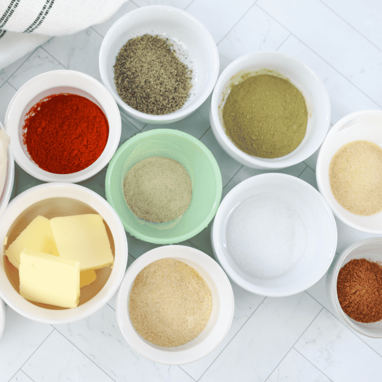 Ingredients for copycat McCormick lemon pepper seasoning: black pepper, dried lemon zest, salt, citric acid, sugar, onion and garlic powder
