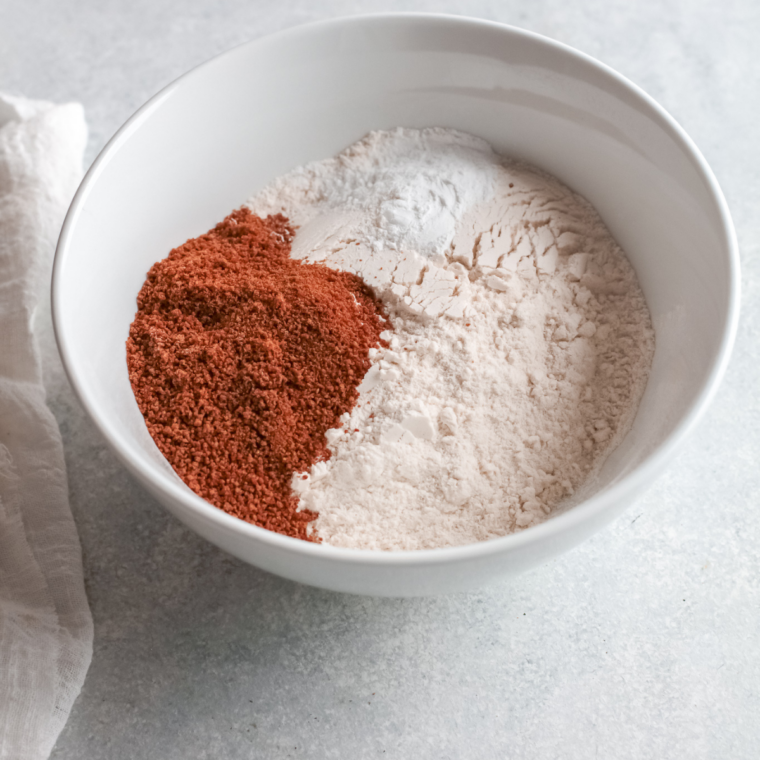 All six copycat McCormick Smokehouse Maple seasoning ingredients measured into a small bowl