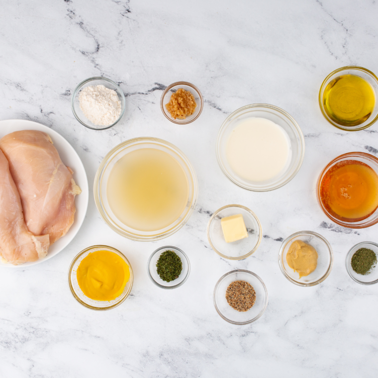 Ingredients needed for Copycat McDonald's Honey Mustard on kitchen table.