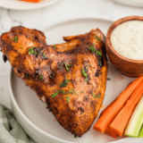 Crispy fries seasoned with homemade salt-free spice blend and a side of dip
