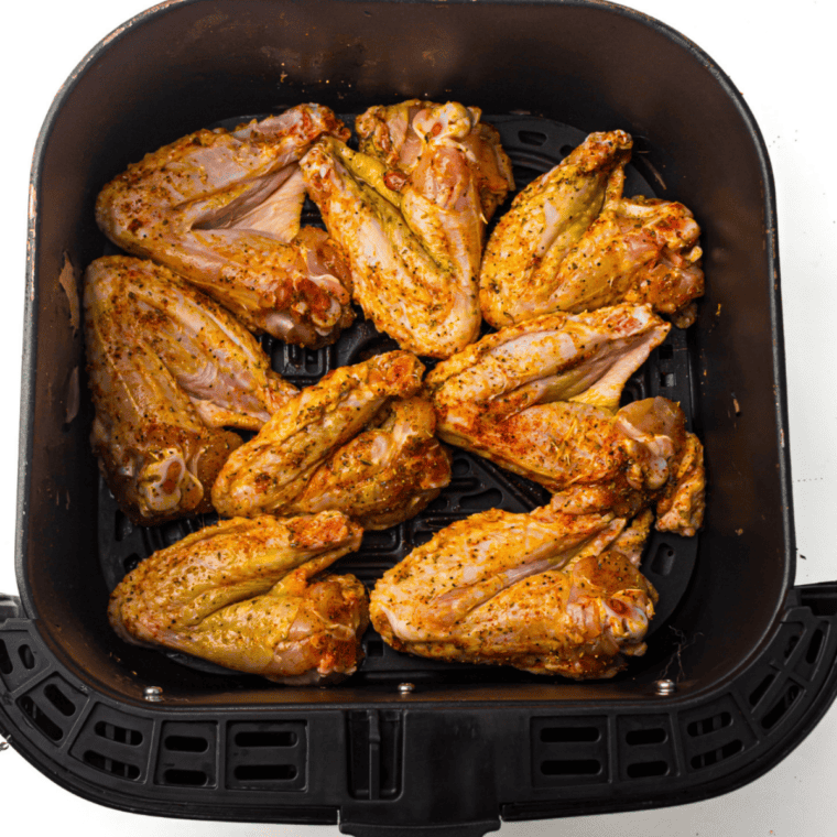 Close-up of seasoned chicken wings coated in salt-free spice blend