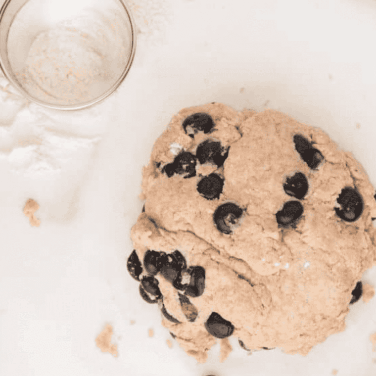 scone dough patted into circle and cut into eight wedges on floured surface