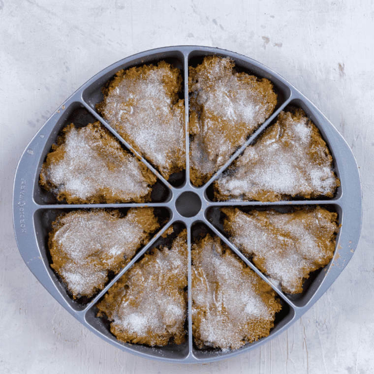 Maple glaze drizzled over Copycat Starbucks Maple Oat Nut Scones
