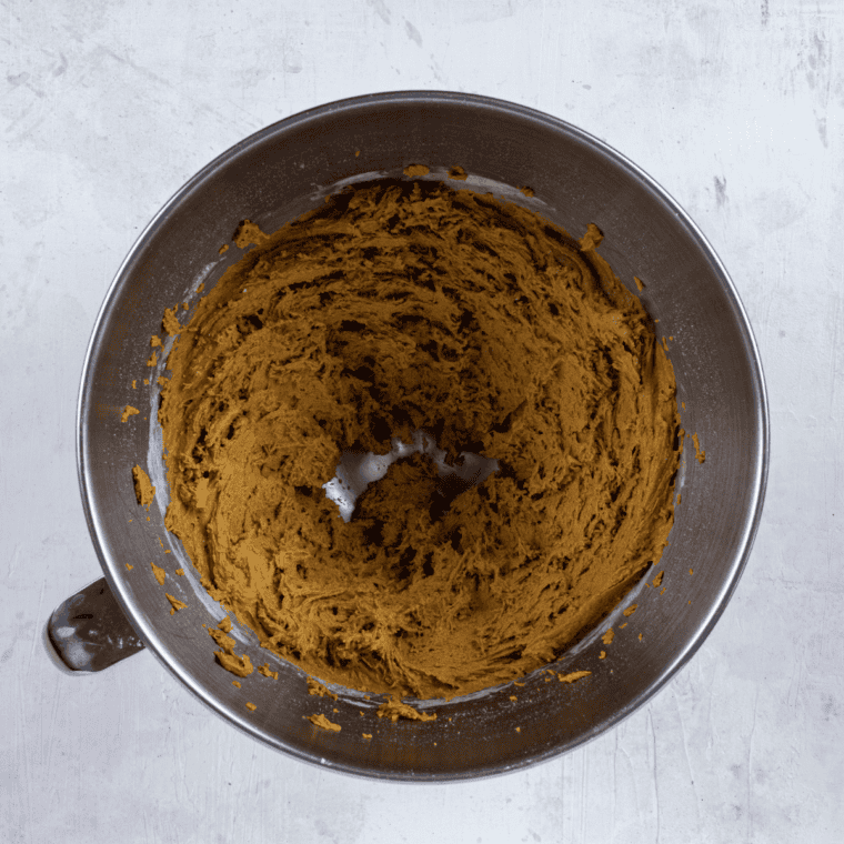 Cream, egg, and maple wet ingredients whisked in a bowl