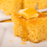 Square of moist Jason's Deli sweet cornbread topped with melting butter