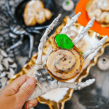 These easy Halloween cinnamon rolls use canned dough to make adorable pumpkins and ghosts. A fun, no-fuss spooky breakfast the whole family will love!
