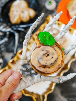 These easy Halloween cinnamon rolls use canned dough to make adorable pumpkins and ghosts. A fun, no-fuss spooky breakfast the whole family will love!