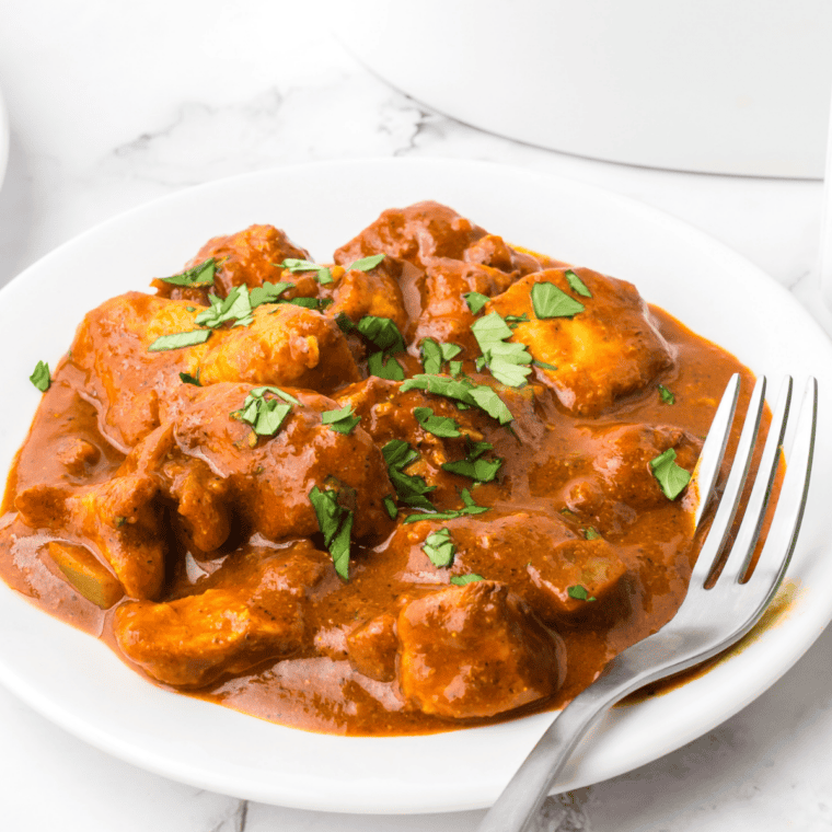 Air fryer chicken vindaloo in a spicy red curry sauce