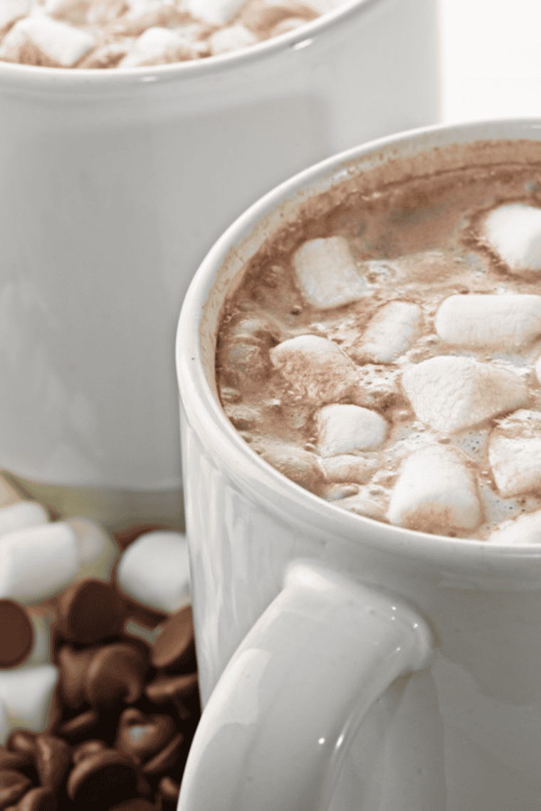 Jack Daniel's hot chocolate poured into a mug and topped with whipped cream and chocolate shavings
