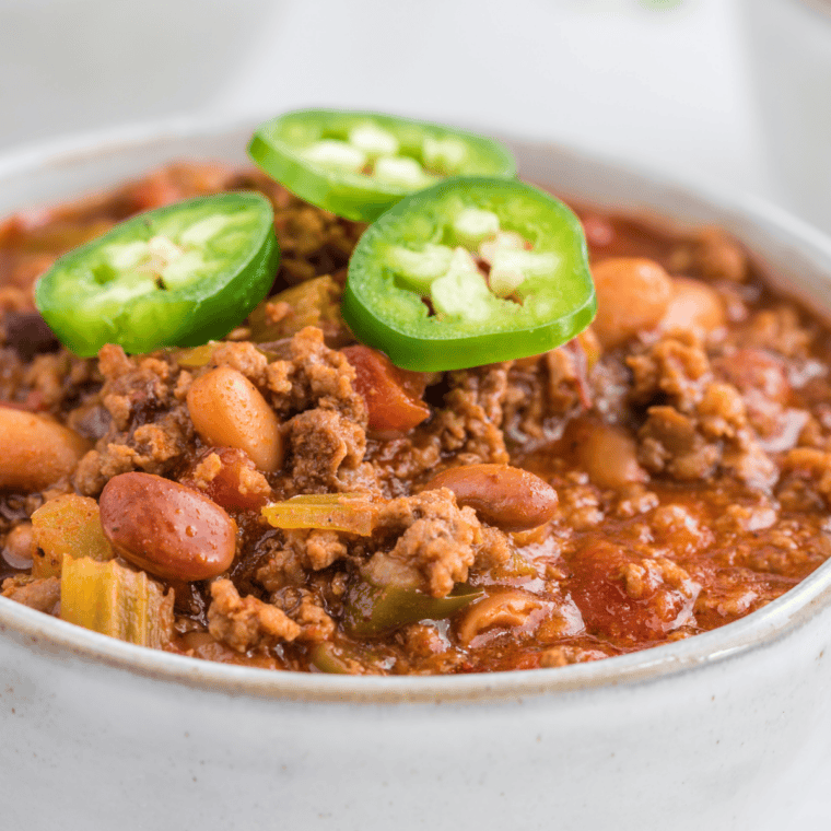 slow cooker mccormick chili recipe with lid off showing thickened beef and beans