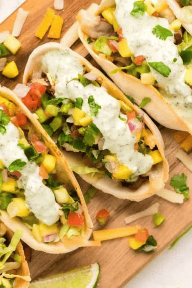 Creamy Mexican lime mayonnaise drizzled over tacos