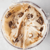 Ninja Creami Blue Bell Homemade In The Shade ice cream in a bowl with a chocolate fudge swirl