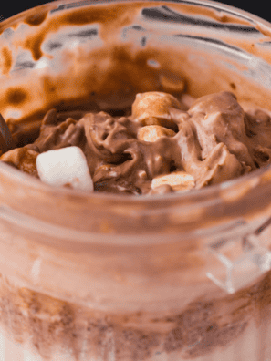 Ninja Creami copycat Blue Bell Rocky Road ice cream in a pint with marshmallows and almonds