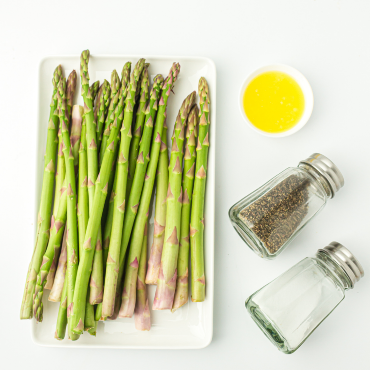 Ingredients needed for Ninja Crispi Asparagus on kitchen counter.