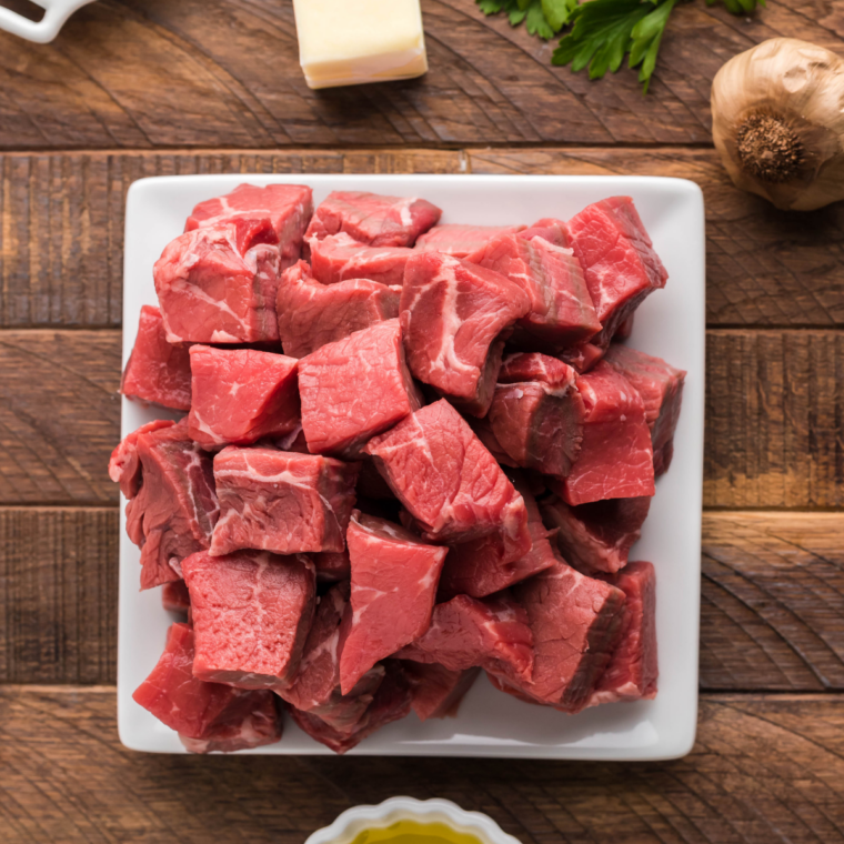 Ingredients needed for Ninja Crispi Steak Bites on kitchen table.