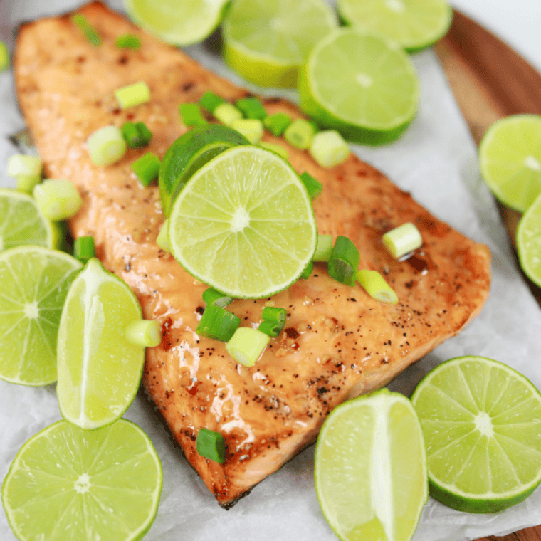 Lemon-Dill — Bright lemon and dill salmon marinade in a small bowl with fresh dill and lemon