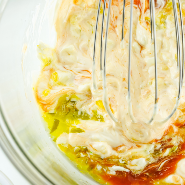 Whisking mayonnaise, relish, and seasonings into smooth Big Mac special sauce in a small bowl.