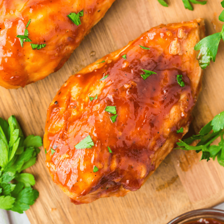 Grilled honey bourbon chicken served with rice and grilled vegetables