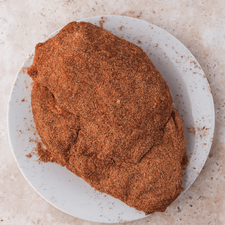 Homemade Cuban complete seasoning rubbed all over a raw pork roast before cooking