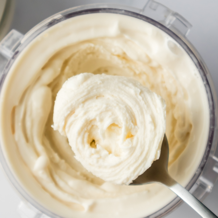 Close-up of creamy Blue Bell Sweet Cream Ninja Creami ice cream on an ice cream scoop