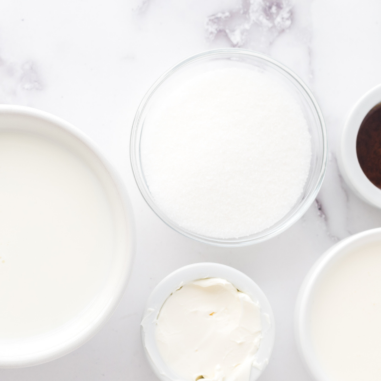 Ingredients for Cold Stone Sweet Cream Ice Cream in the Ninja Creami: whole milk, heavy cream, sugar, cream cheese, vanilla pudding mix, vanilla, and salt  