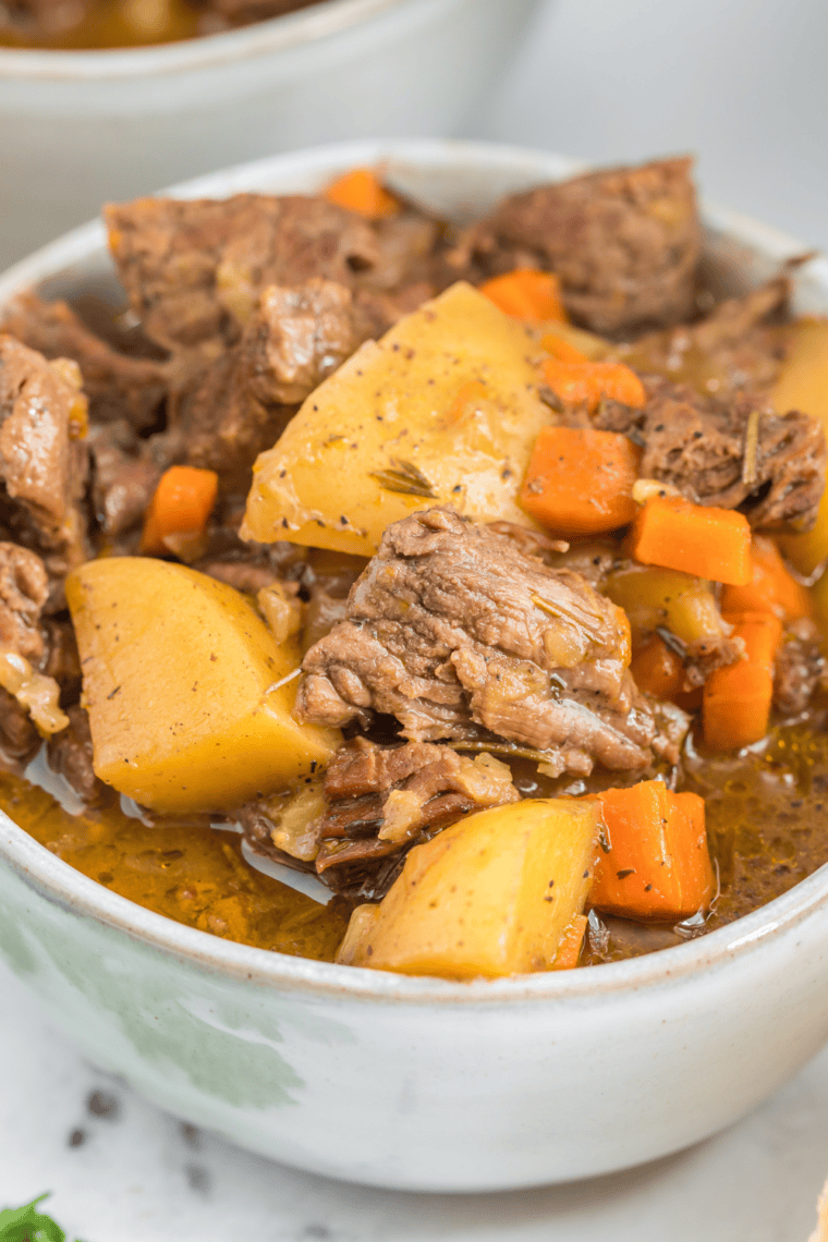 Shredded pot roast in a bowl made with homemade beef stew seasoning mix