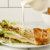 This copycat LongHorn Caesar Salad Dressing Recipe brings that rich, garlicky steakhouse flavor straight to your kitchen — no reservation required. It's creamy, tangy, loaded with Parmesan, and comes together in about 10 minutes with a handful of pantry ingredients. Once you make it at home, you'll never reach for the bottled stuff again.