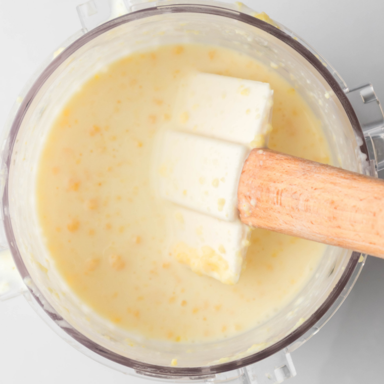 Whisking peanut butter, cocoa, milk, and cream into a smooth chocolate base for Ninja Creami ice cream
