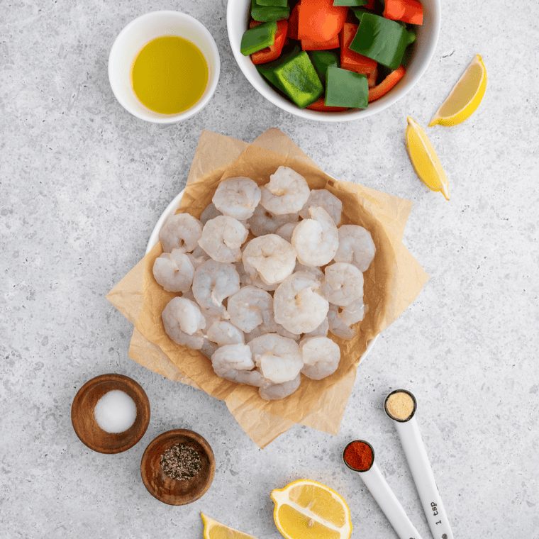Ingredients for copycat Red Lobster Cajun seasoning &mdash; paprika, garlic powder, cayenne, and spices in bowls