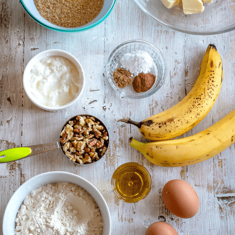 Ingredients shot: Ingredients for Bob Evans banana bread: ripe bananas, sour cream, butter, sugar, eggs, flour, and walnuts