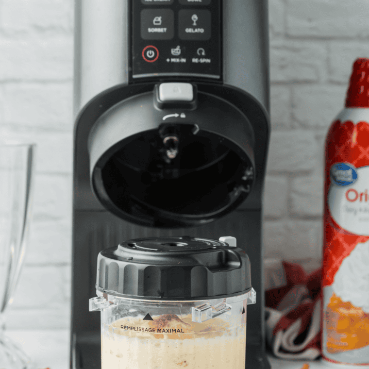 Ninja Creami pint container spinning a copycat Chick-fil-A Autumn Spice Milkshake on the MILKSHAKE setting