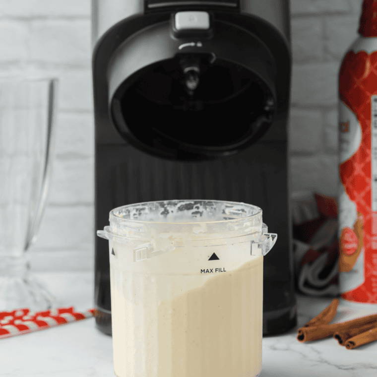 Autumn Spice Milkshake base dispensing from a Ninja Slushi machine into a tall glass