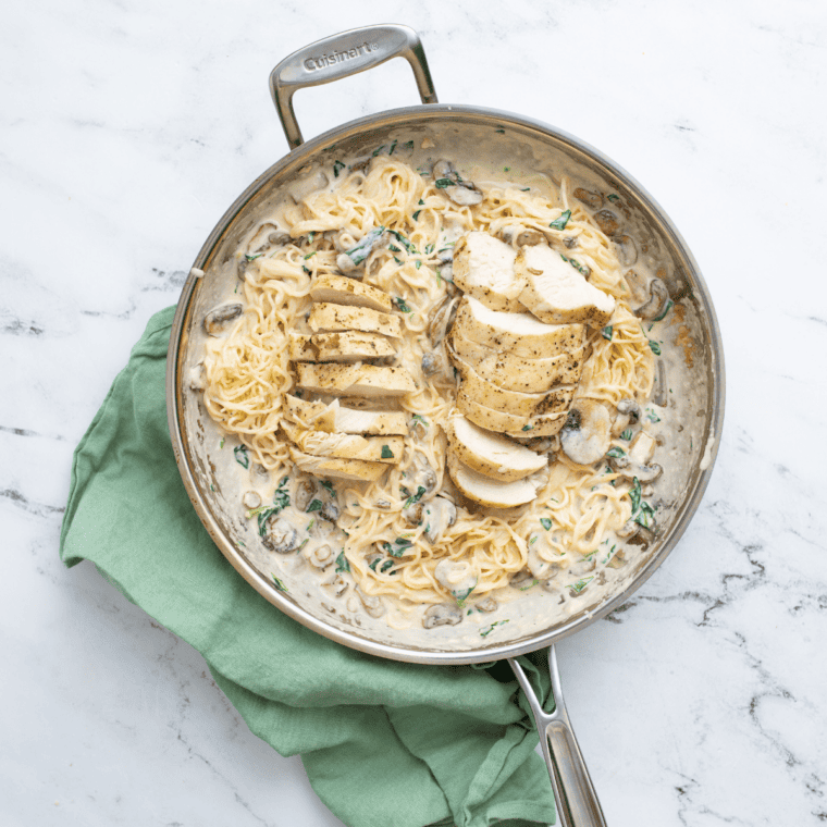 Chicken La Madeleine finished in the skillet with mushroom sauce spooned over