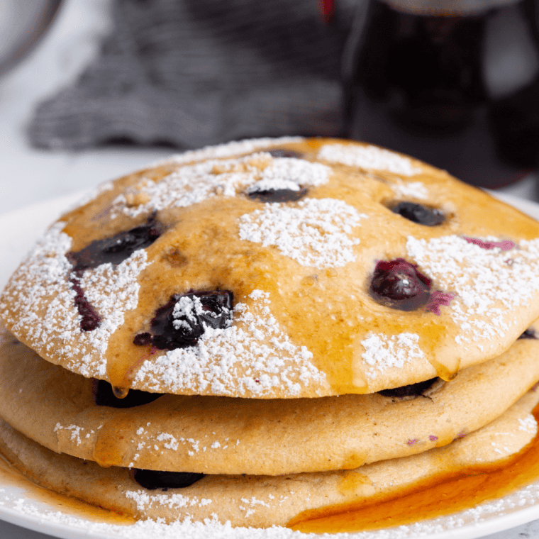 Cooked hotcakes resting on a wire rack to keep the bottoms from steaming