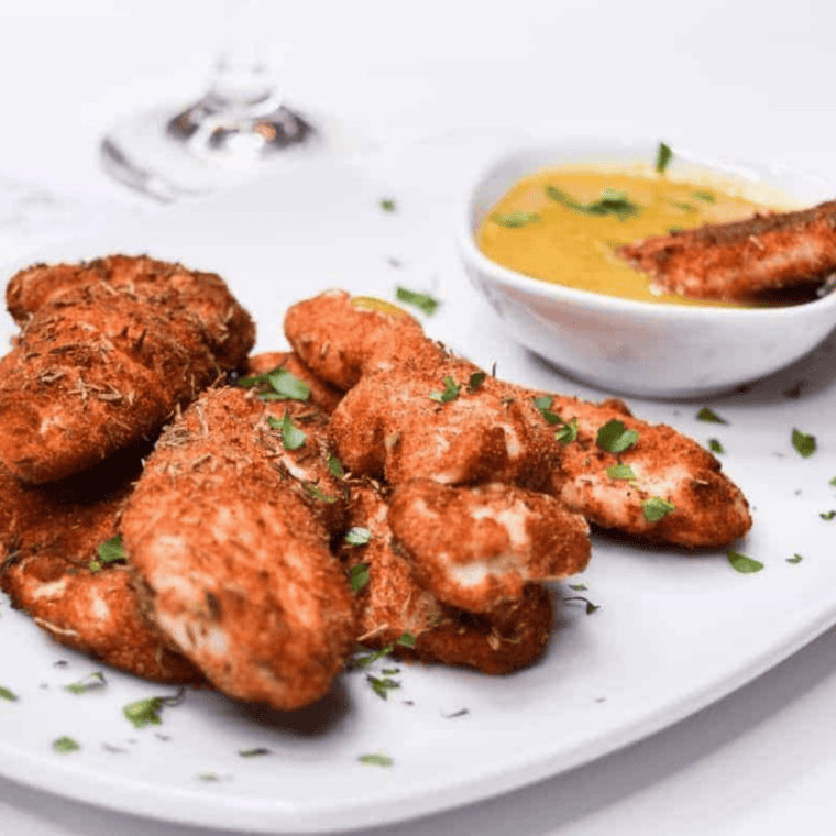 Crispy chicken tenders seasoned with homemade woodfired garlic blend