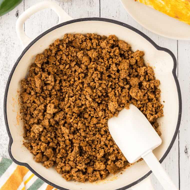 Finished taco meat with thickened sauce coating the ground beef