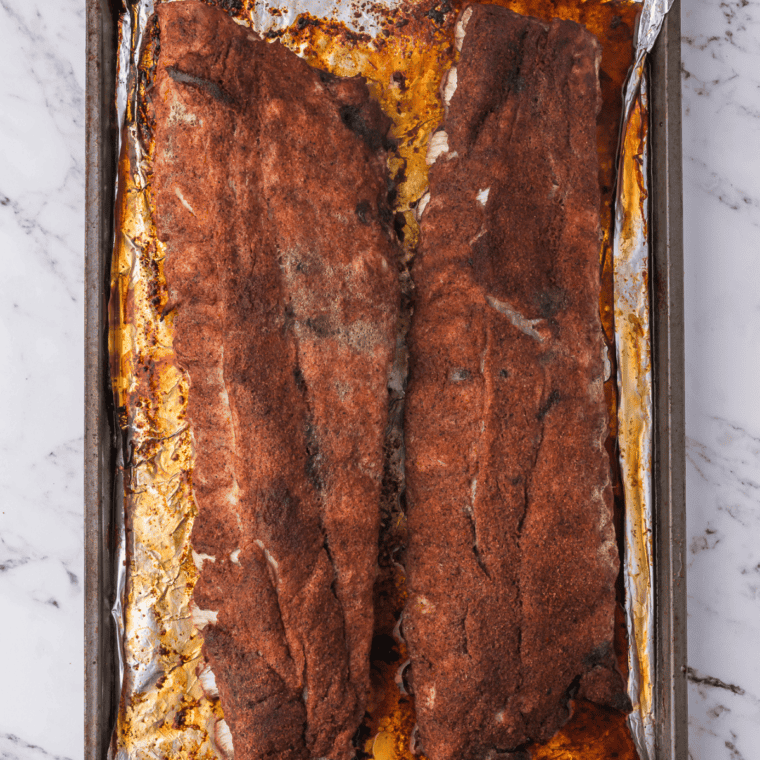 Prairie Dust dry rub ribs pulled apart to show the tender meat