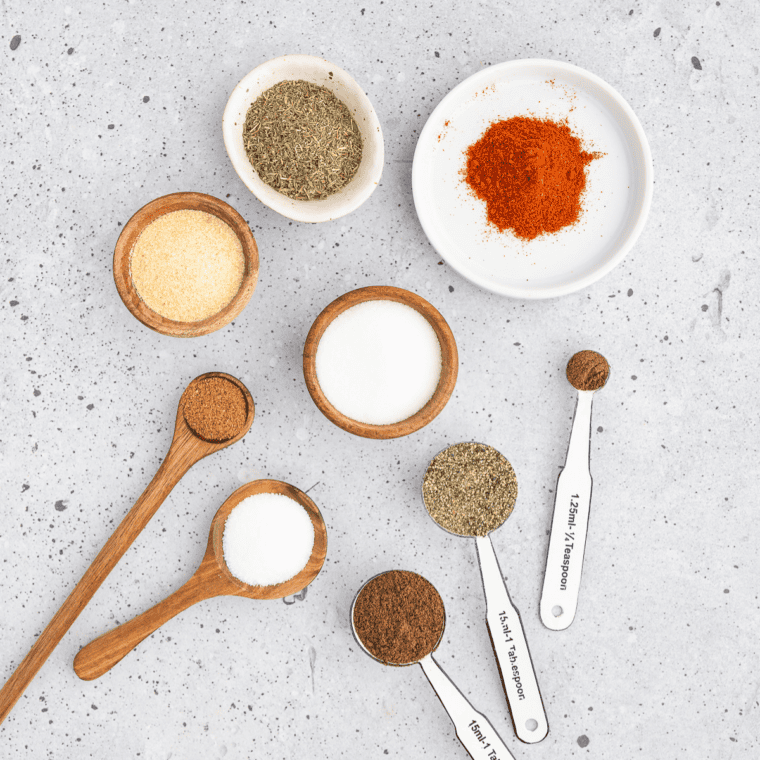 Bowl of copycat Ruth's Chris steak seasoning blended with paprika, pepper, and dried parsley