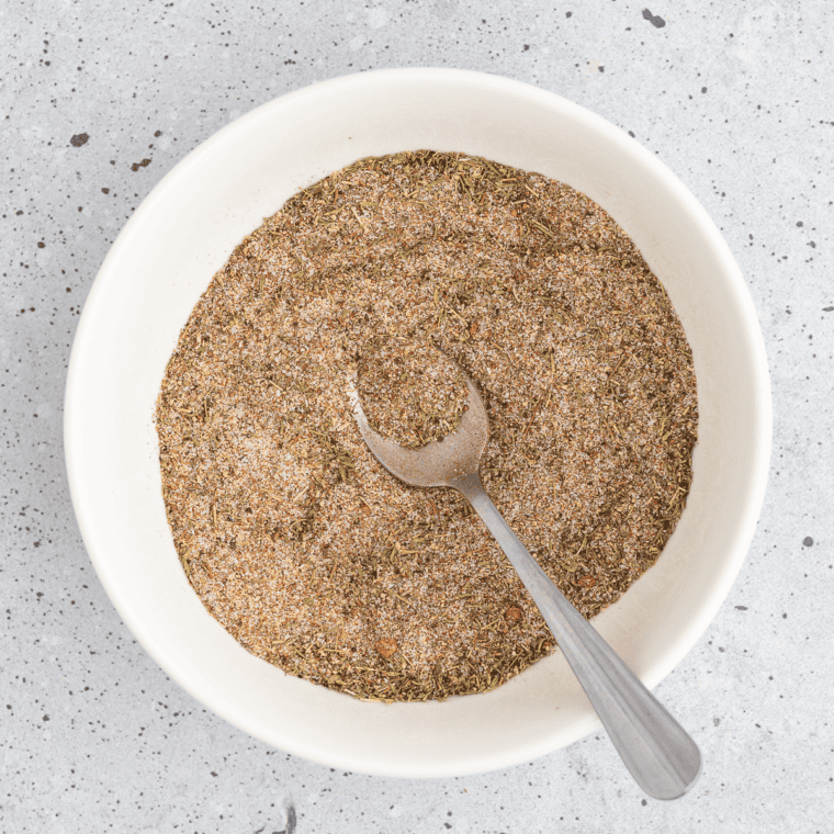 Whisking the steak seasoning ingredients together into an evenly blended rub
